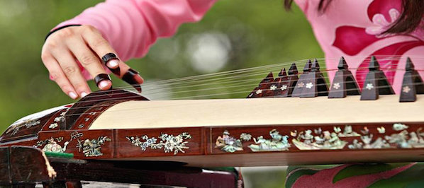 This Zither musical instrument is played on the embassy open house day in Washington D.C, close to the Dupont Circle hotel. 