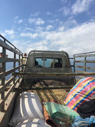 Travelling in the back of a farm truck in Laos, by Pierce Lowney of The River Lee in Cork