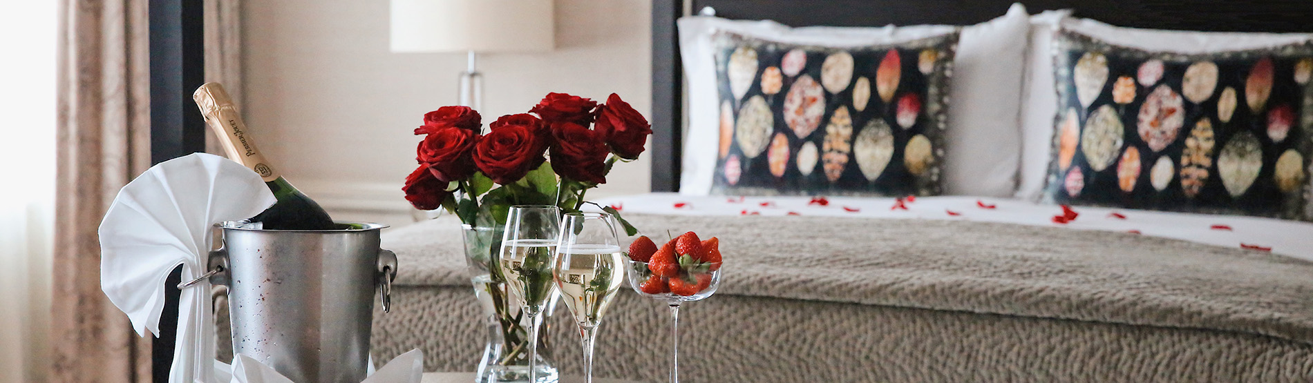 Bedroom with Champagne and red roses