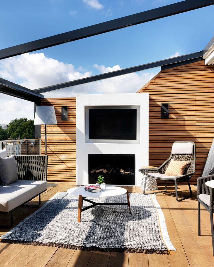 The stylish and luxurious surrounds of The Terrace Suites outdoor area with stunning views of London