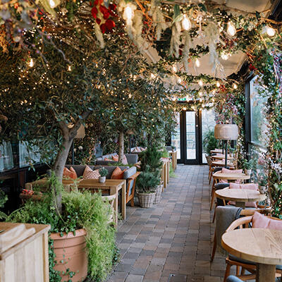 River Club Bar and Terrace decked out for the winter season with twinkling lights and wintery decorations.